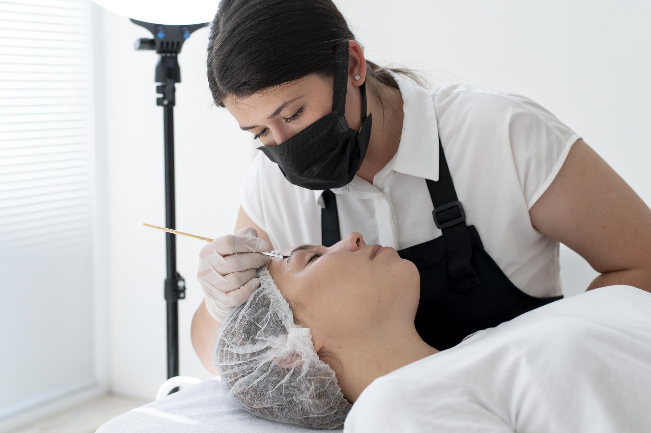 young-woman-going-through-microblading-procedure