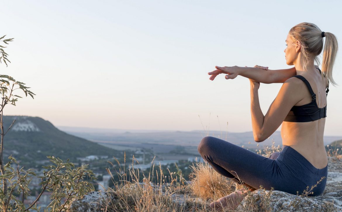 beautiful-blonde-woman-practicing-yoga-outdoors (1)
